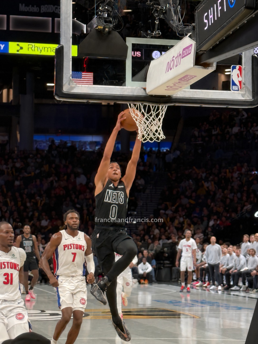 A close view of the action at the rim.