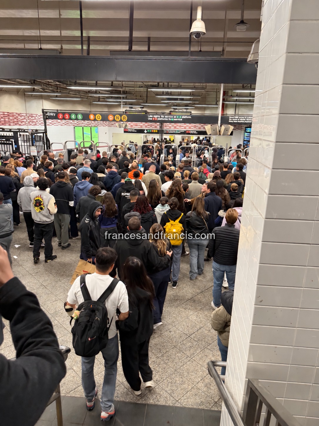 The crowded subway entrance after the game.